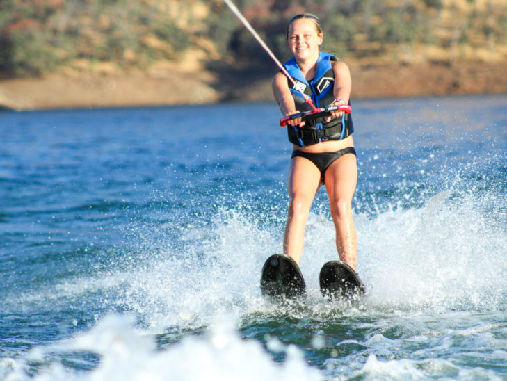 A camper water skiing.