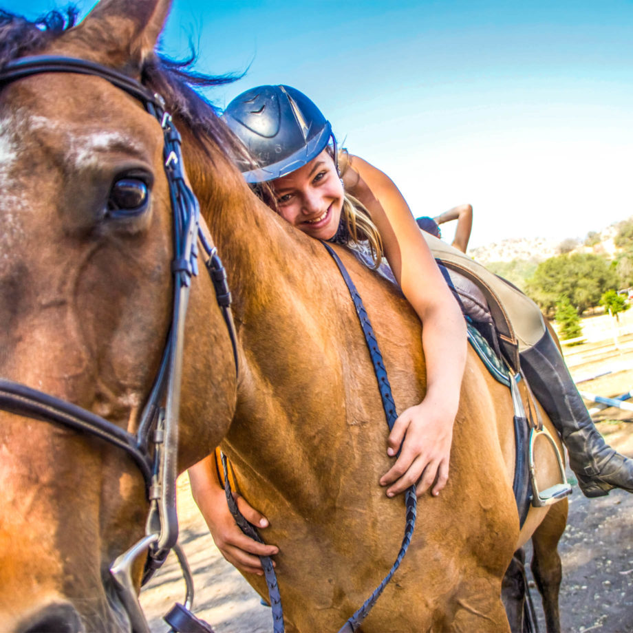 A camper on a horse.