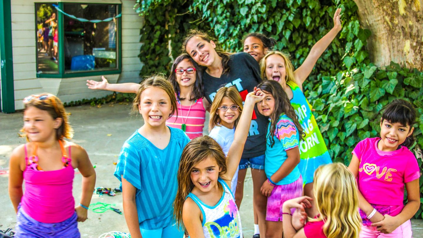 Campers smiling and posing for the camera