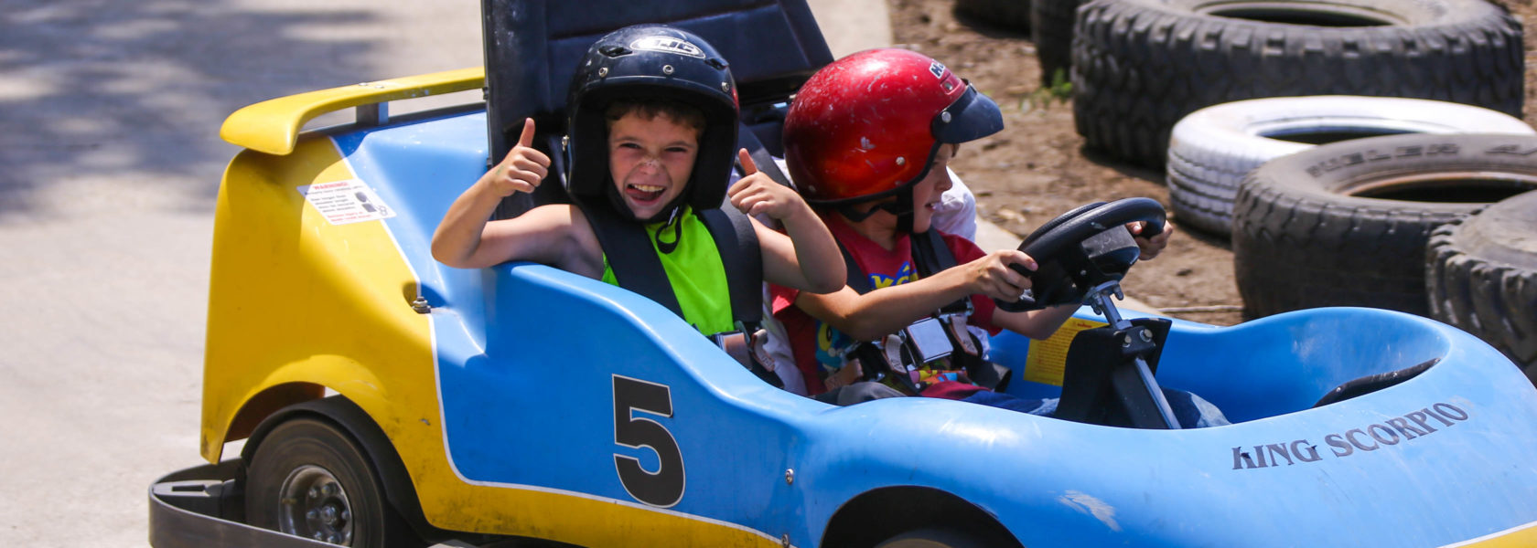 Campers having fun go-karting