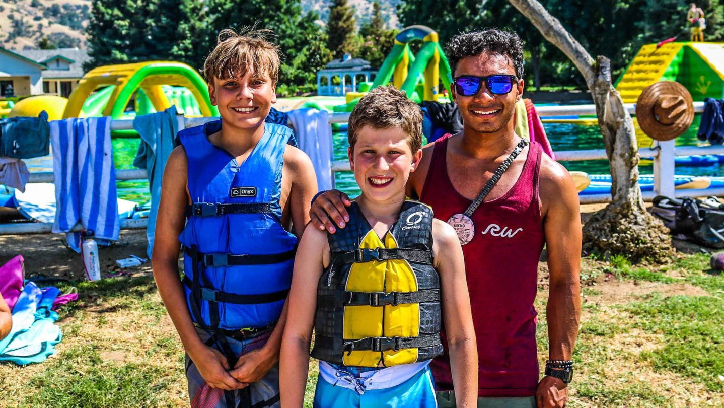 Campers posing with lifevests