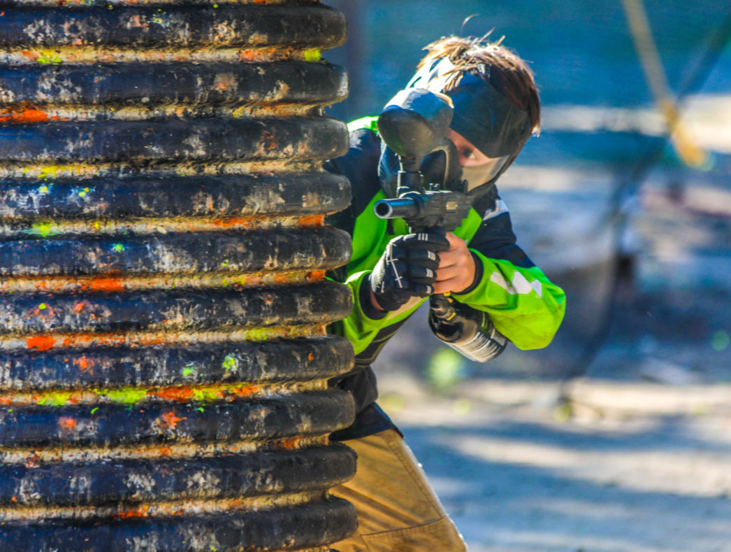 A camper playing paintball