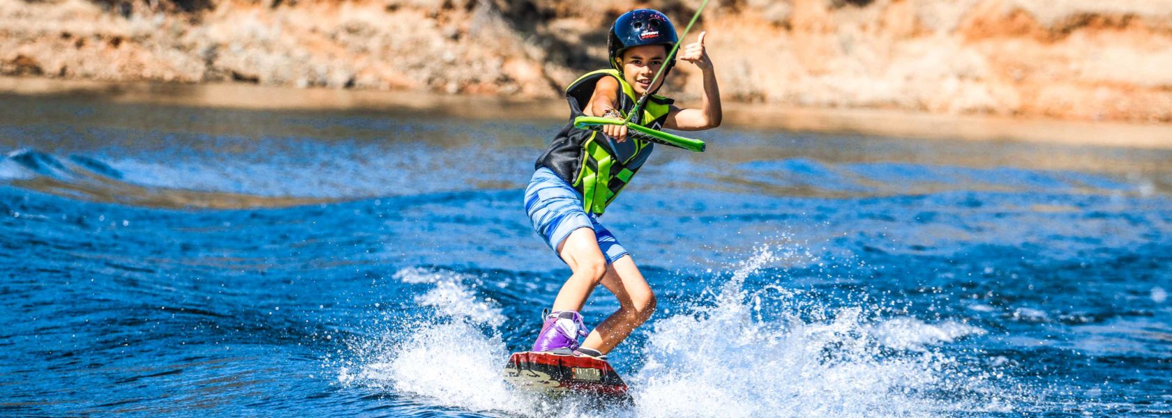 A camper waterskiing