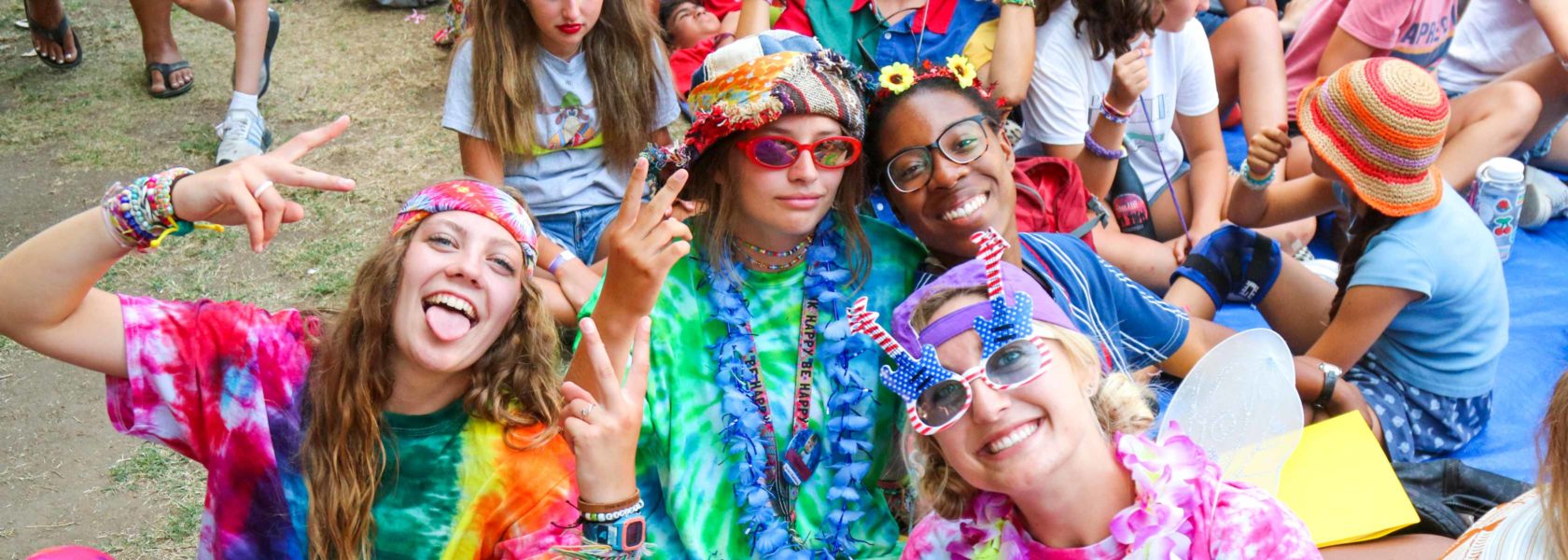 Camp staff dressed in tye dye clothes