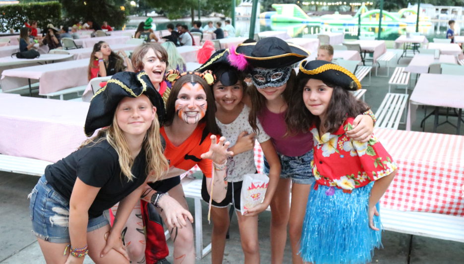 campers posing for a photo in costume